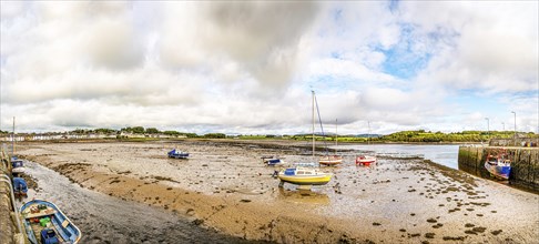 Panorama of the town and beached boats in the harbour at low tide, Garlieston, Dumfries & Galloway,