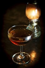 Manhattan classic whisky cocktail drink in modern bar