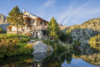 Espot, Spain, September 2015: View on JM blanck mountain hut in the Spanish Pyrenees during golden