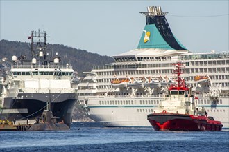 Bergen, Norway, May 2015: Harbor scene in Bergen, Norway, with cruise ship and towing boat and