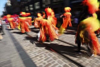 Traditional summer samba carnival in Helsinki, Finland, blurry photo taken at long exposure, 2022,