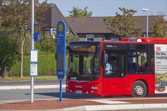 Bus stop with bus, Jever, Lower Saxony, Germany, Europe