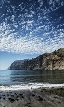 Los gigantes cliffs natural famous landmark and volcanic black sand beach in south tenerife island