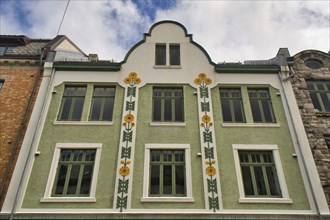 Alesund, Norway, May 2015: Vertical shot of the architecture of Kongens gate 12 in Alesund, Norway,