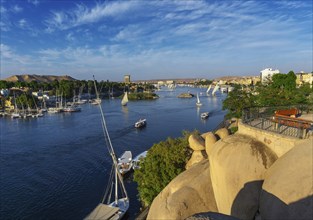 Beautiful landscape with felucca boats on Nile river in Aswan at sunset, Egypt, Africa