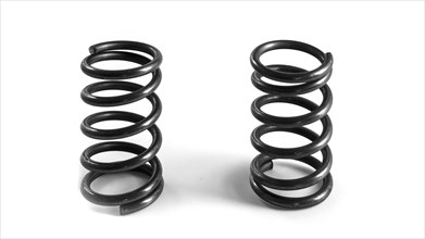 2 car springs on a white background. Isolated spare parts for vehicle repair