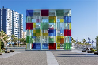 Malaga, Spain, April 2023: View on the Centre Pompidou colorful cube architecture by Daniel Buren.