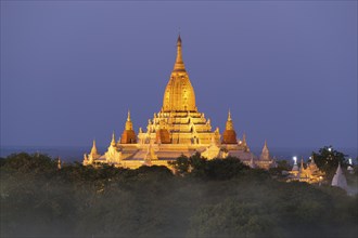 Illuminated Ananda Temple Pagoda (Paya) in Bagan at night, Myanmar (Burma)