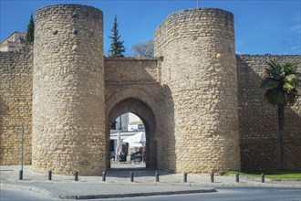 Ronda, Spain, April 2023: View on the Puerta de Almocabar, ancient gate to the town of Ronda,