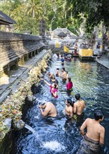 Bathers at the Tirta Empul Temple, Bali, Indonesia, Asia