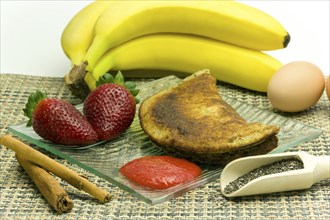 Banana, egg and chia seed pancakes with strawberry puree