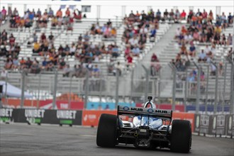 SCOTT MCLAUGHLIN (3) of Christchurch, New Zealand runs through the streets during the Honda Indy