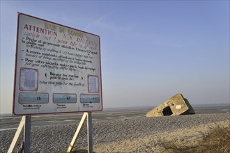 Information panel and Second World War bunker on the beach at Le Hourdel near