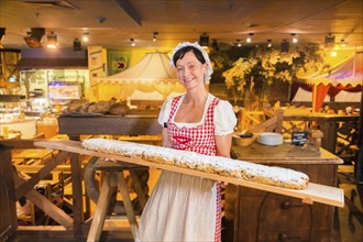 Baker with a giant stollen