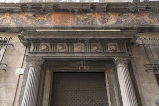 Historical frescoes above the entrance door at Palazzo Pinelli Parodi in the historic centre,