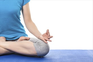 Close up of yoga Padmasana (Lotus pose) cross legged position for meditation with Chin Mudra,