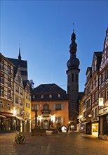 Market square with town hall, half-timbered houses and tower of the parish church of St. Martin in