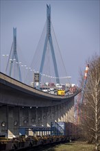 The Köhlbrand Bridge in the port of Hamburg, at the back of the goods train line, spans the 325 m