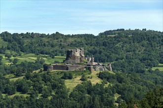 View of the medieval castle of Murol in the Auvergne Volcanoes Regional Natural Park, Puy de Dome,