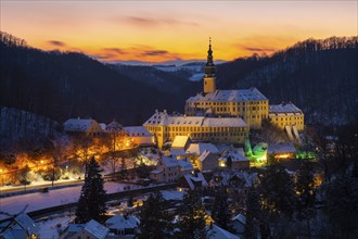 Winter evening in the Müglitz valley, impressively illuminated Weesenstein Castle at the blue hour,