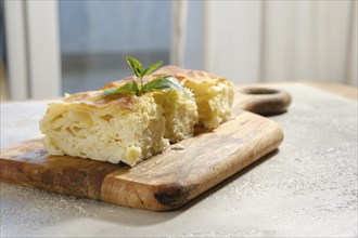 Traditional Georgian homemade cheese pie Achma served on a table