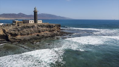 Aerial view of lighthouse Faro Punta de Jandia at southern tip of peninsula Jandia, in the