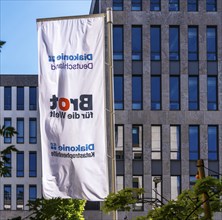 Flags in front of the office of Bread for the World, Berlin-Mitte, Germany, Europe