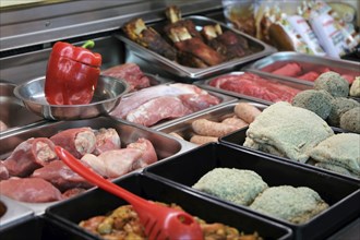 Variety of fine meat products in the butchery (Variety of fine meat products in the butchery)