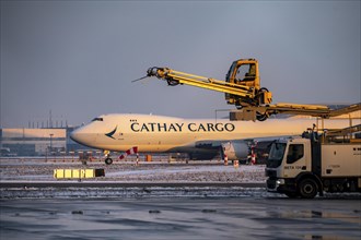 Winter at Frankfurt Main Airport, FRA, de-icing vehicles waiting for aircraft to be de-iced, Hesse,