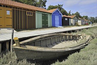 Colourful cabins of oyster farm at la Baudissière near Dolus, Saint-Pierre-d'Oléron on the island