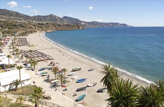 Playa Burriana sandy beach at popular holiday resort town of Nerja, Malaga province, Spain, Europe