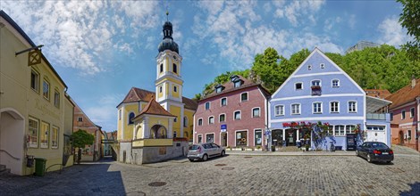 Colourful market square with St. Michael's Church under a bright blue sky, Kallmünz, Upper