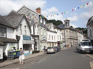 Shops and town hall in North Street, Ashburton, Devon, England, UK