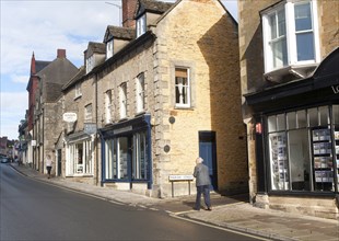 Shops and homes in historic buildings, Malmesbury, Wiltshire England, UK