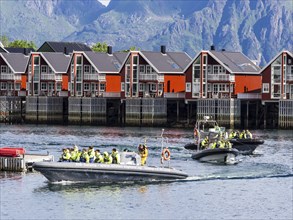 Rib boats with tourists return to Svolvær harbor, Svolvær, Lofoten, Norway, Europe