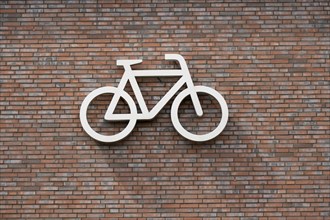 Bicycle symbol on a wall, pictogram, bicycle car park, Dülmen, Münsterland, North Rhine-Westphalia,