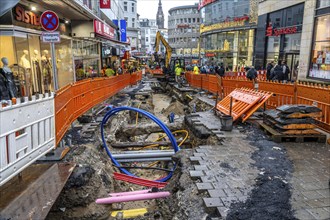 Construction site in the city centre of Wuppertal, laying of new pipelines, various supply lines