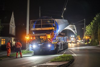 Transport of a 68 metre long, 22 tonne blade of a wind turbine, here in Schwelm, with a