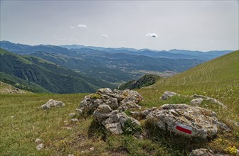 Mountain landscape on the edge of the Pian Grande di Castelluccio di Norcia plateau in the Monti