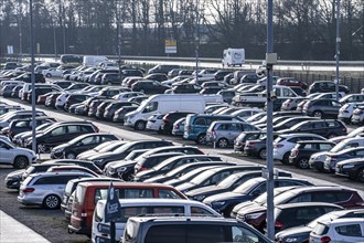 Large car park at the ferry terminal to the East Frisian islands of Norderney and Juist, Lower