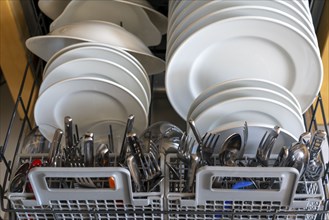 Dishwasher, full of clean crockery