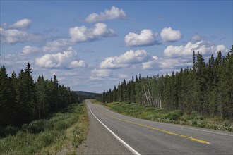 Endless straight road without traffic, Klondike Highway