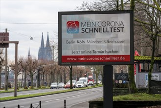 LED billboard, with digital advertising for Corona rapid tests, in the test centre in Cologne, on