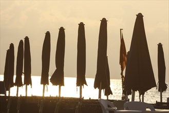 Sunshades on the beach of Diana Marina, Italy, 14/08/2024, Diano Marina, Liguria, Italy, Europe