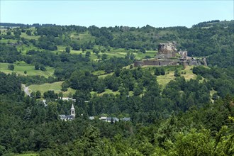 View of the medieval castle of Murol in the Auvergne Volcanoes Regional Natural Park, Puy de Dome,