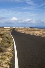 Road approaching Caleta de Caballo village, Lanzarote, Canary islands, Spain, Europe