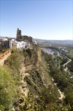 Cliff top buildings church of San Pedro, village of Arcos de la Frontera, Cadiz province, Spain,