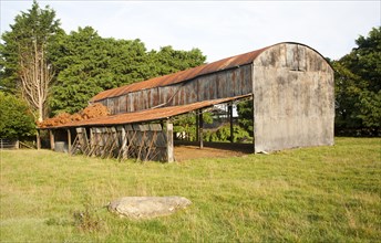 Rusty old barn in Compton Bassett, near Calne, Wiltshire, England, UK