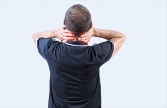 Rear view of Mature man with neck tension isolated. People suffering with neck pain isolated. Neck