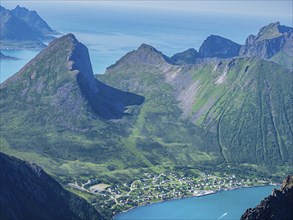 View over fjord Örnfjord to village Fjordgard, at foot of mountains Segla (left) and Hesten, seen